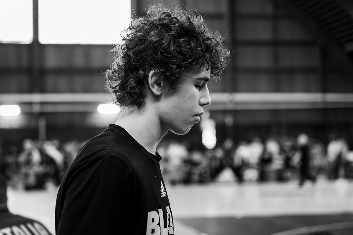 Student-athlete working through mindset coaching with mentor